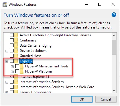 Windows Features dialog with the Hyper-V checkbox selected for removal and deactivation.